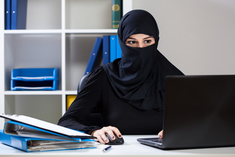 DFEH Harassment Prevention Training presents true or false scenario for a woman wearing a religious mask at work.